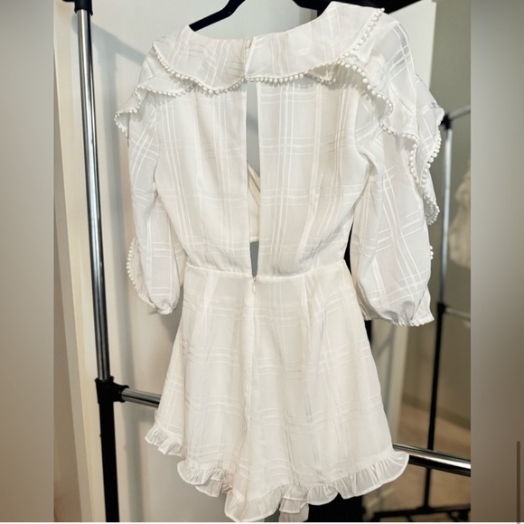 NEVER WORN - Enzo Romper
MAJORELLE
Color: Ivory
Size: S
MAJORELLE - Picture 9 of 12